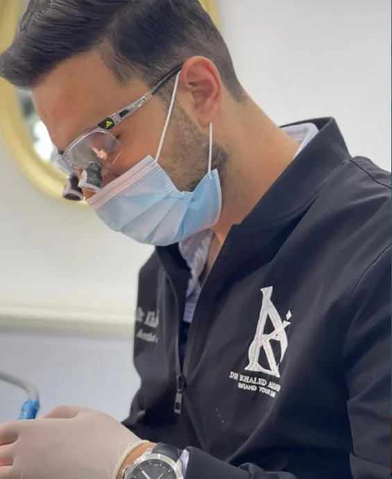 dentist khaled al sayed making veneers and dental implants in amman jordan